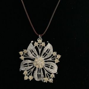 Brown leather cord, silver tone/rhinestone pendant necklace